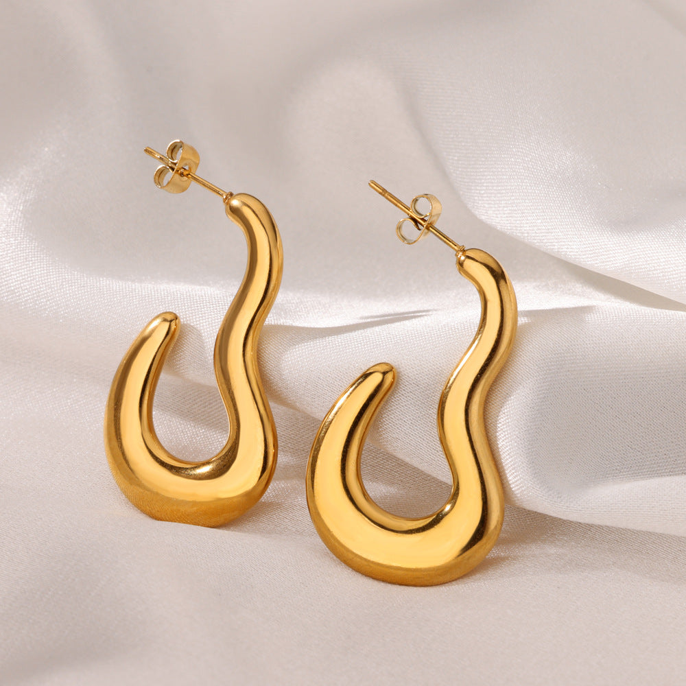 Swurl – Gold Curve Earrings