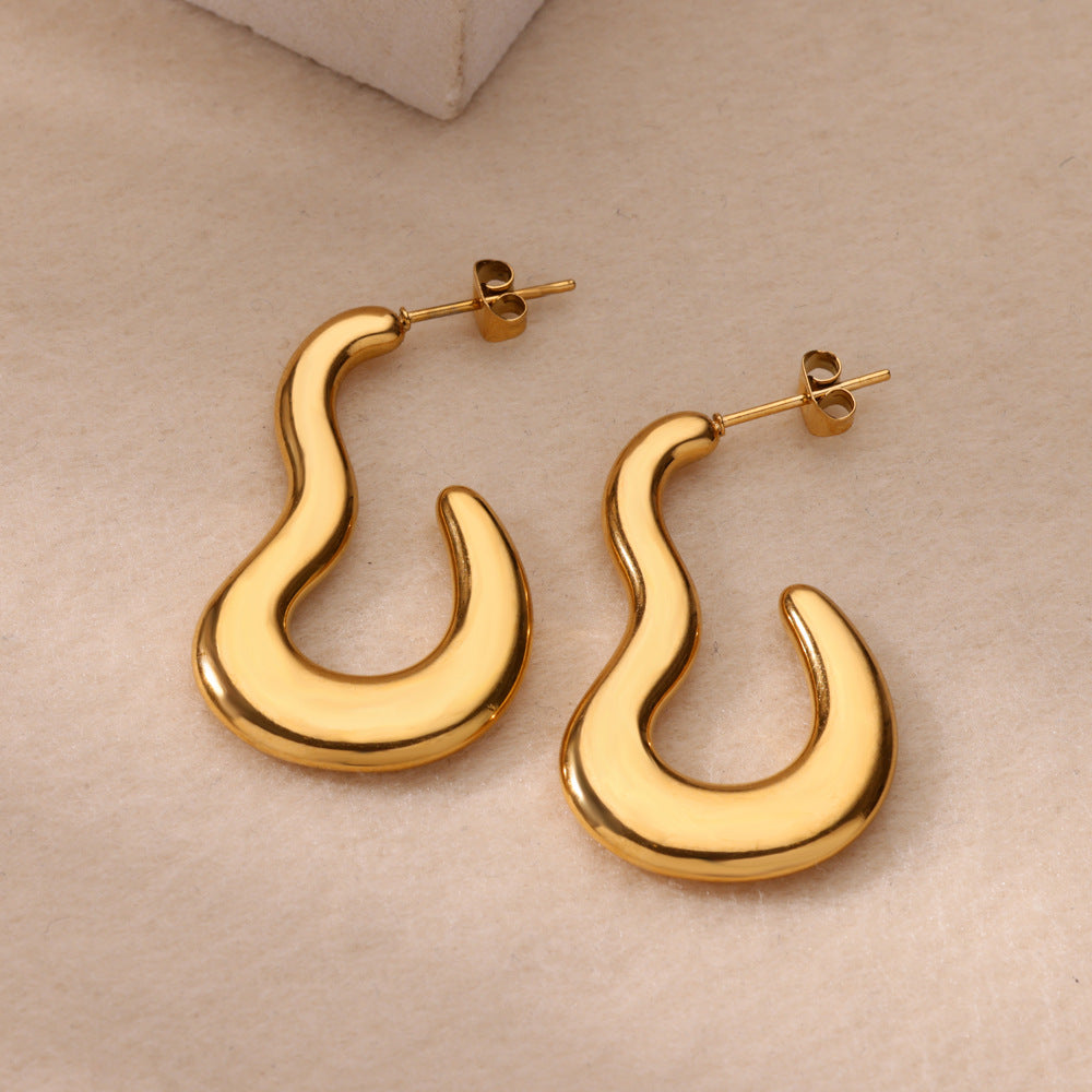 Swurl – Gold Curve Earrings
