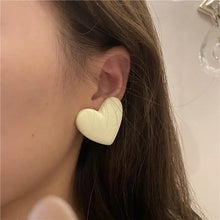 Load image into Gallery viewer, Heart it out studs
