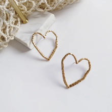 Load image into Gallery viewer, Heart out earrings
