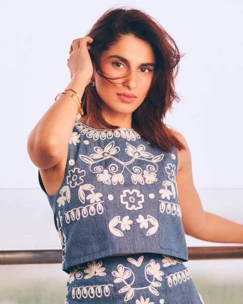 Aisha Ahmed wearing Sweetheart & Bear Charm Cuff